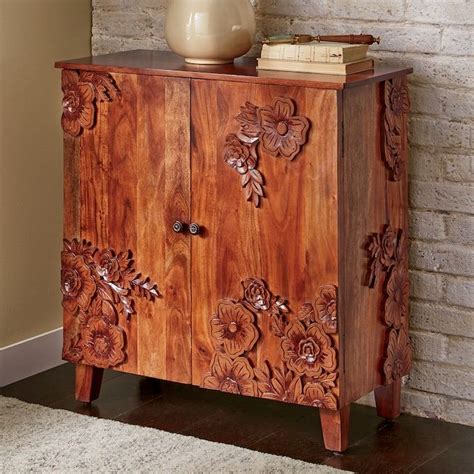 floral carved cabinet